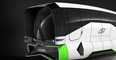 A aurringo autonomous vehicle in green and white