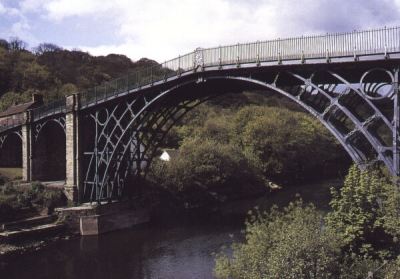 a steel bridge over a river